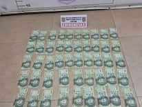 Dinero en efectivo incautado en poder de los detenidos. Foto: PN